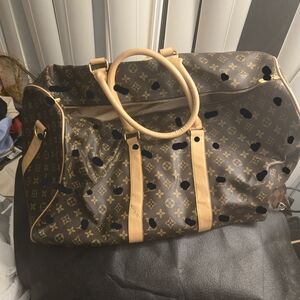 Elegant Brown Monogram Duffel Bag